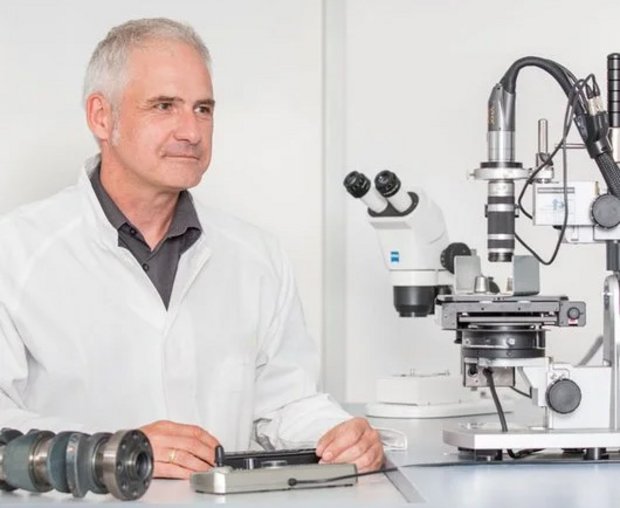 Employee in the laboratory Corrosion research employee in the laboratory