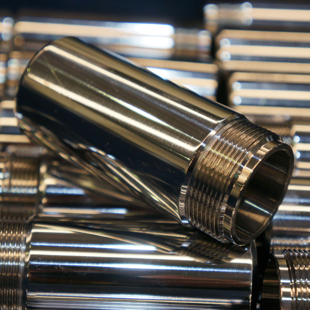 Industrial parts cleaning Industrially cleaned metal part with thread